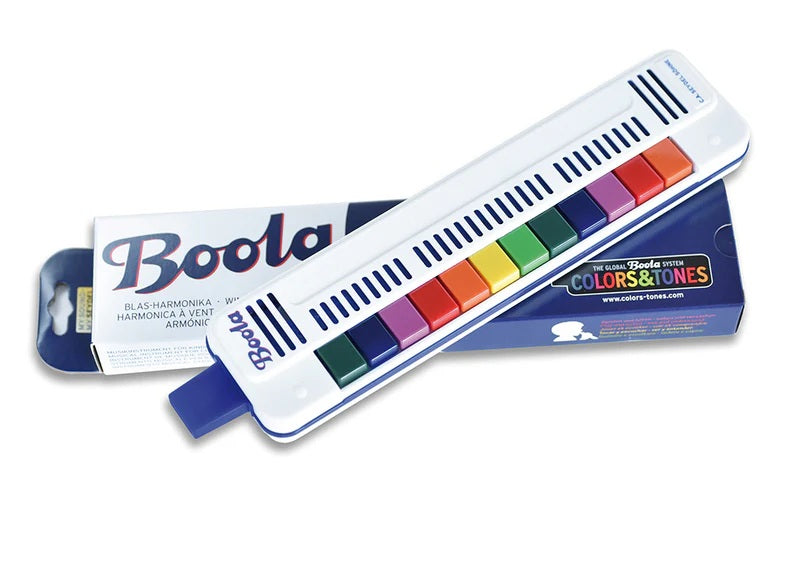 Boola harmonica with color-coded keys on a white background