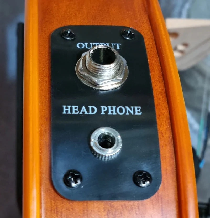Output and head phone slot of an electric violin