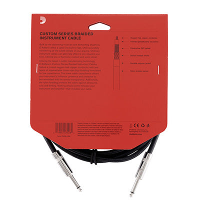 Black instrument cable with red packaging on a white background
