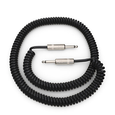 Coiled black audio cable with metal connectors on a white background