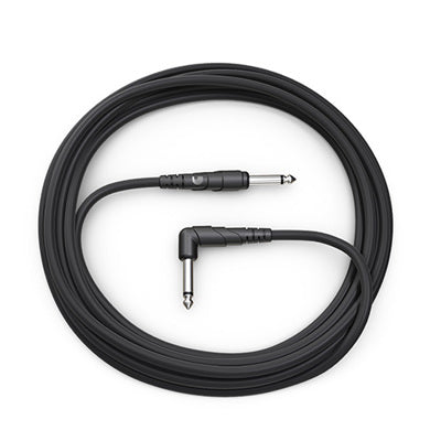 Black guitar cable with two connectors on a white background